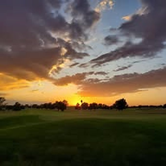 Sunset over the F&H Golf Course fairway